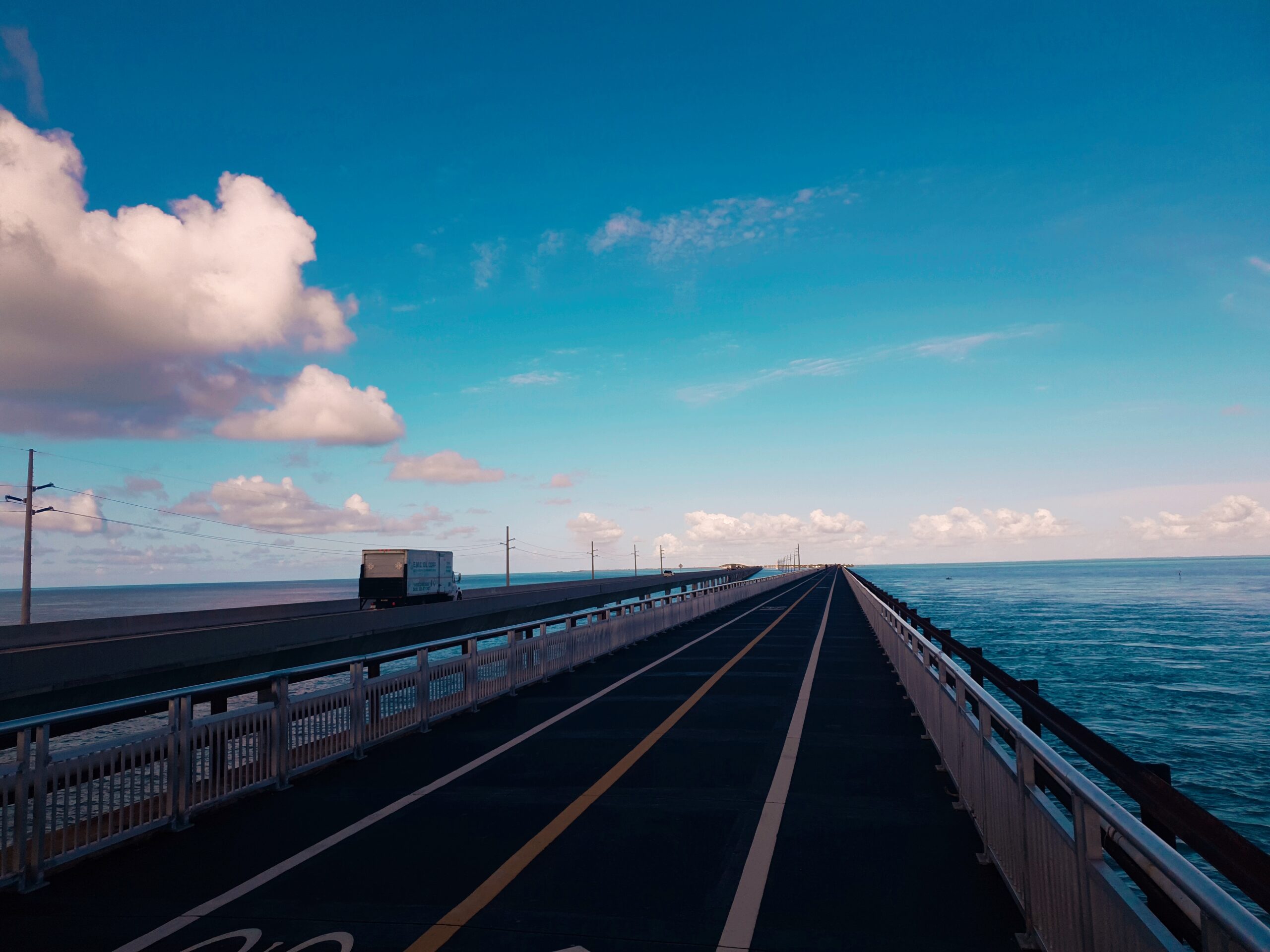 Drive the scenic Highway 1 through the Florida Keys — discover turquoise waters, island sunsets, iconic bridges, and the ultimate coastal road trip.