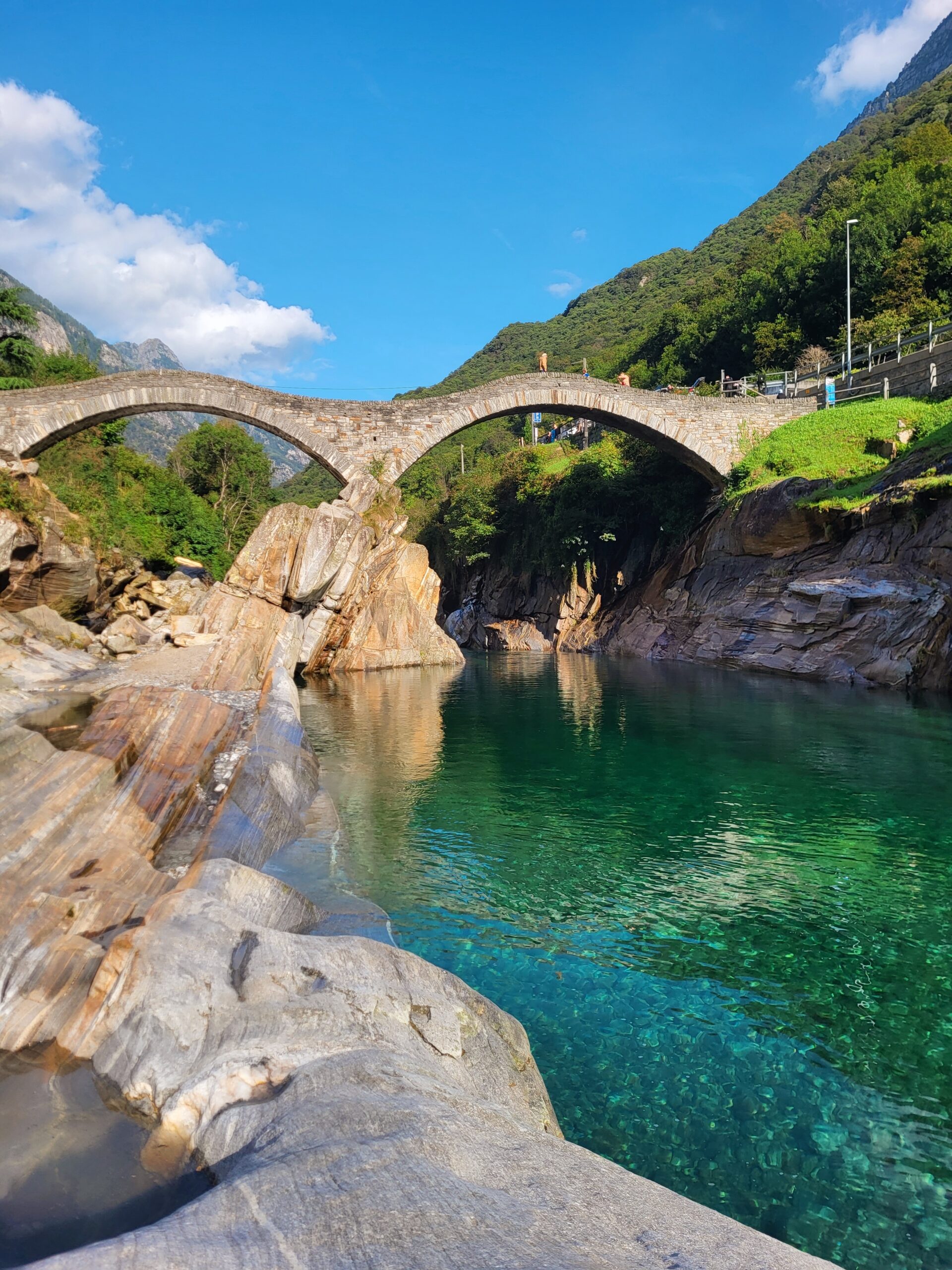Ponte dei Salti, Valle Verzasca – A timeless stone bridge over emerald waters.