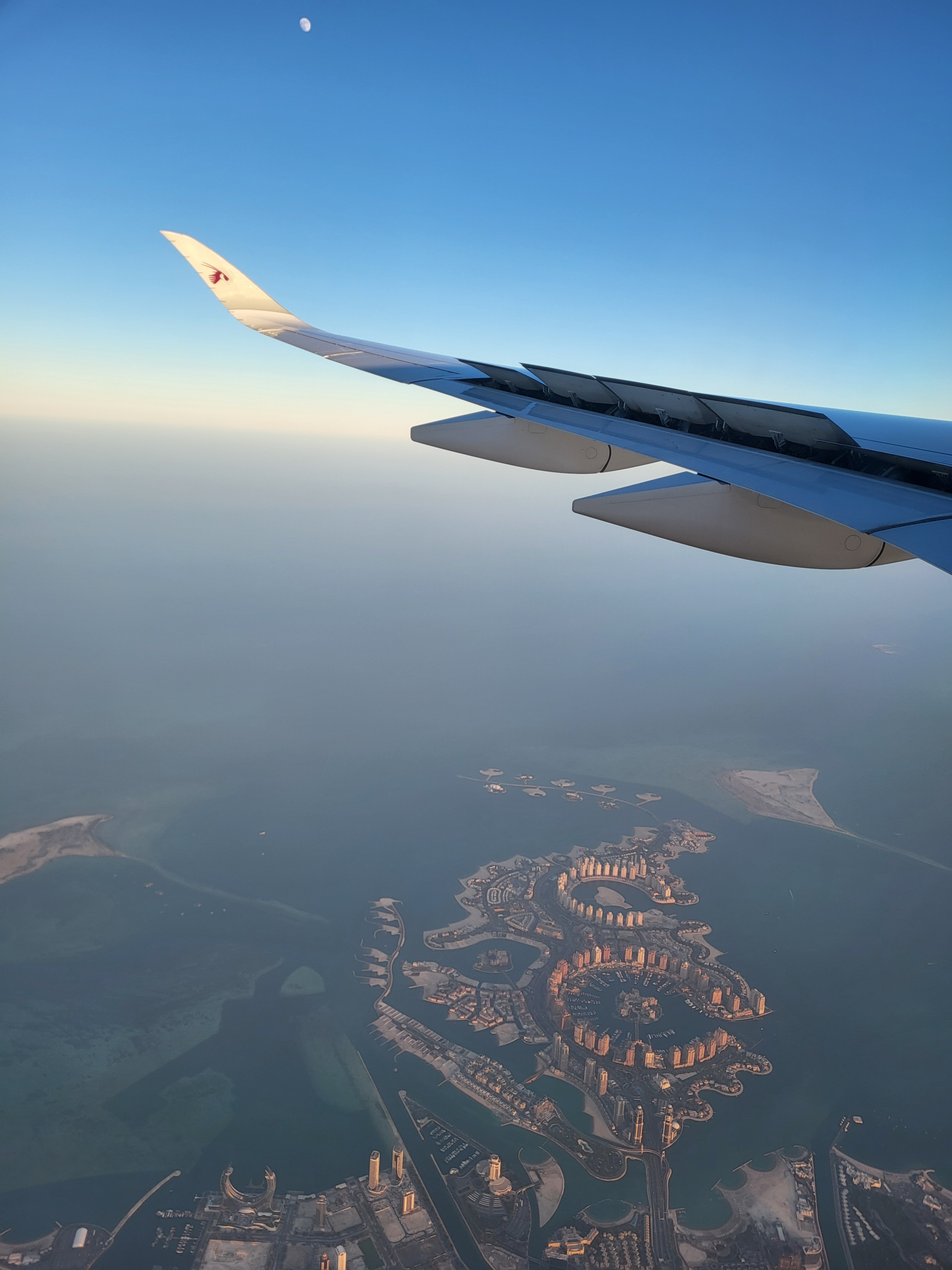 High above the ground, catching the serene beauty of the skies from the plane